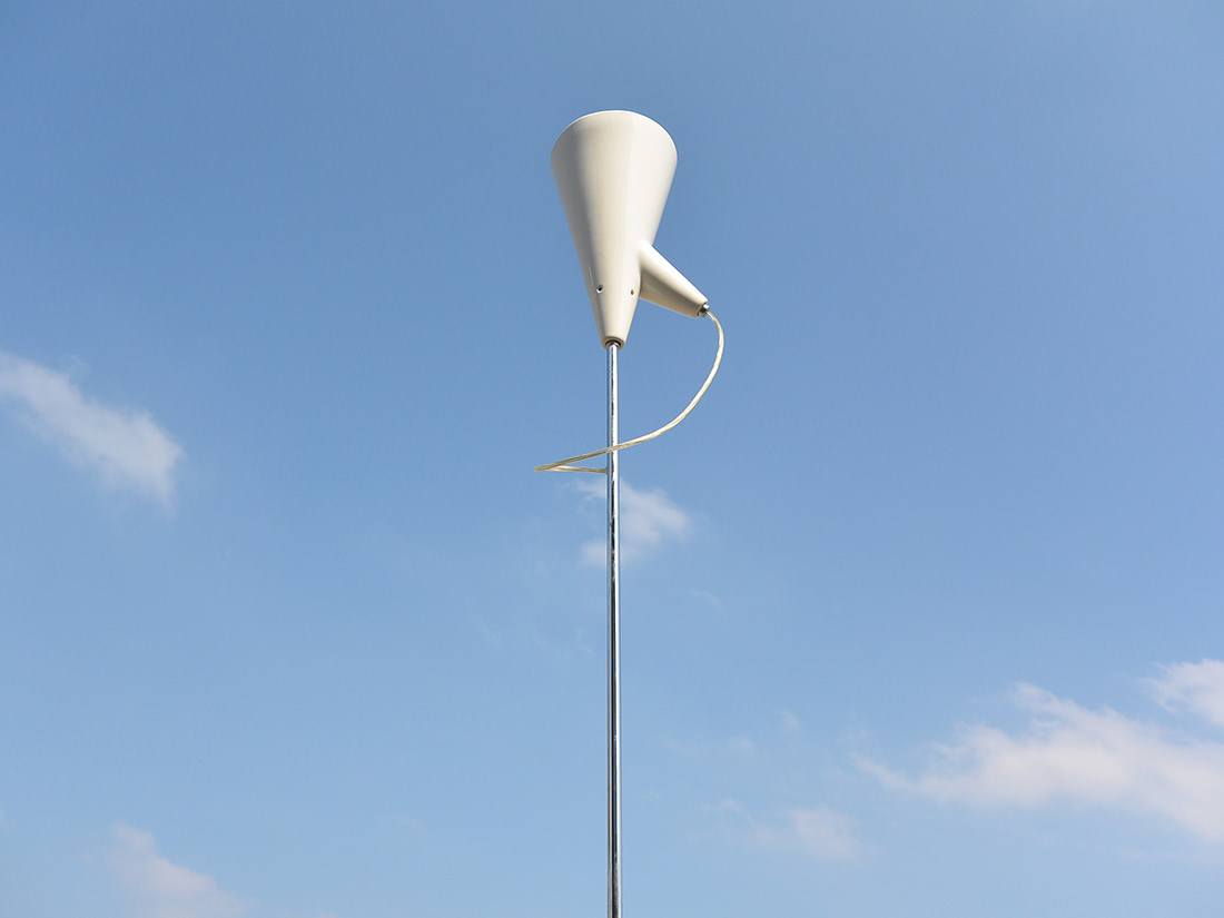 Oluce floor lamp by Sebastian Bergne